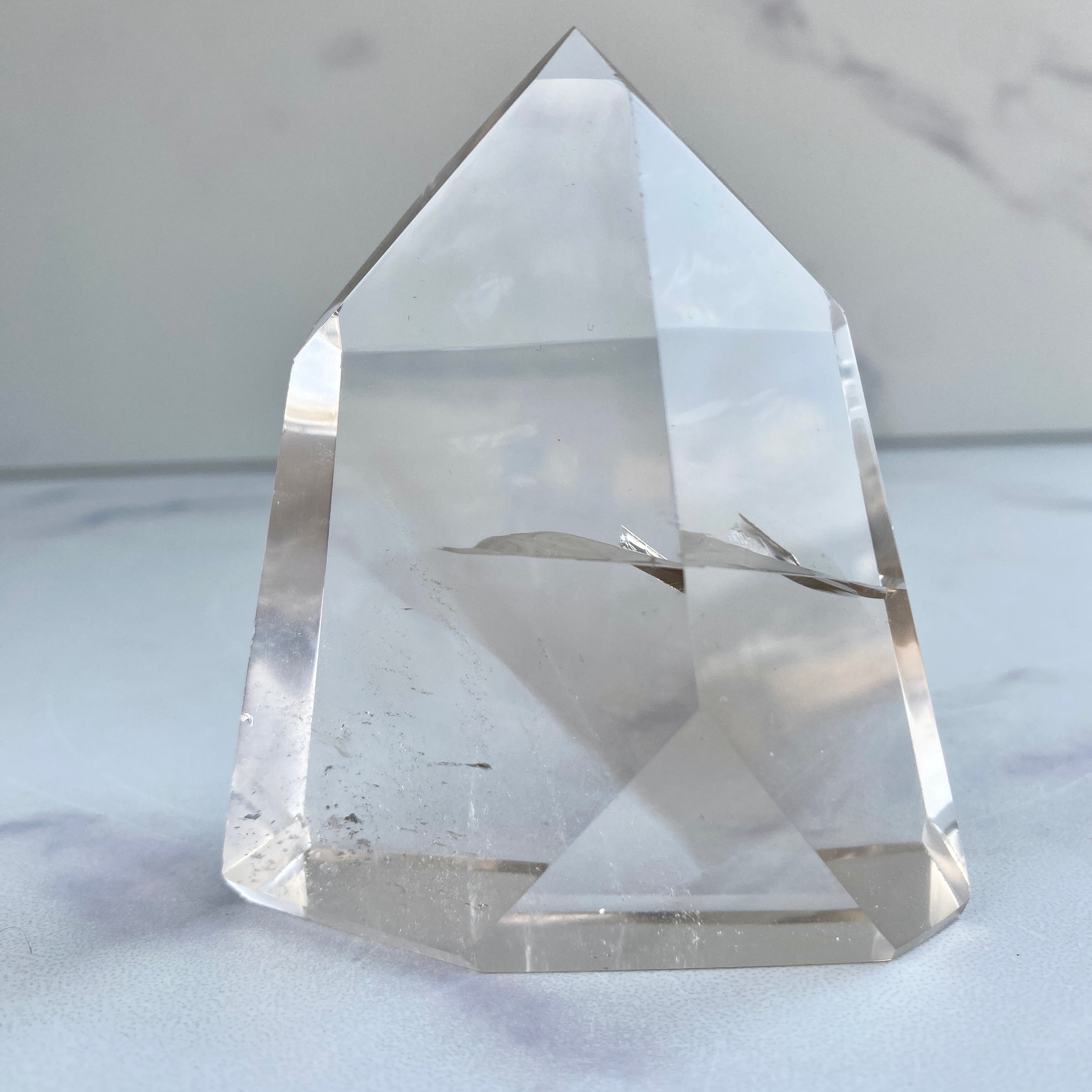 klarer Rauchquarz Turm Facettenschliff